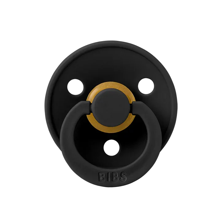 Black and gold baby pacifier with BIBS branding, modern design for infants