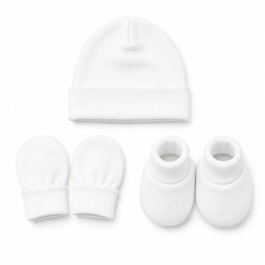 White baby hat, mittens, and booties set for newborns, soft knit essentials for infants