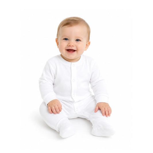 Happy baby in white long-sleeve onesie with footies, South African baby clothing