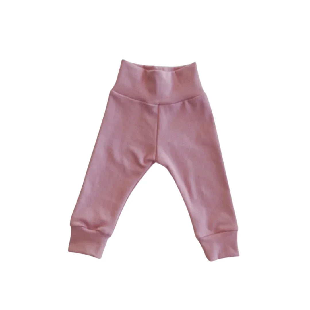 Soft pink baby joggers with elastic waist and cuffs, cozy everyday kids clothing