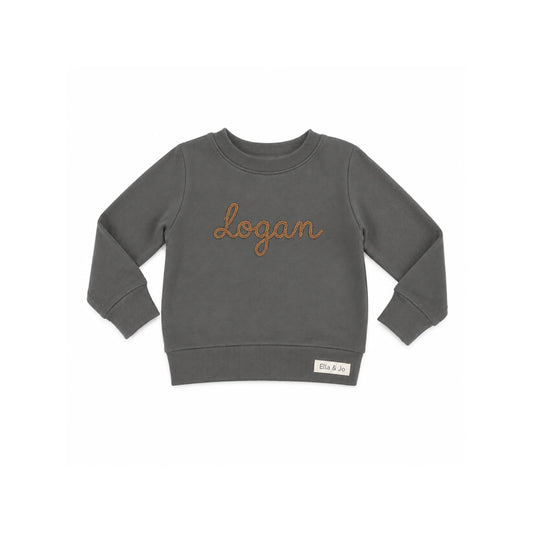 Grey kids sweatshirt with 'Logan' embroidered in brown, featuring Ella & Jo brand tag