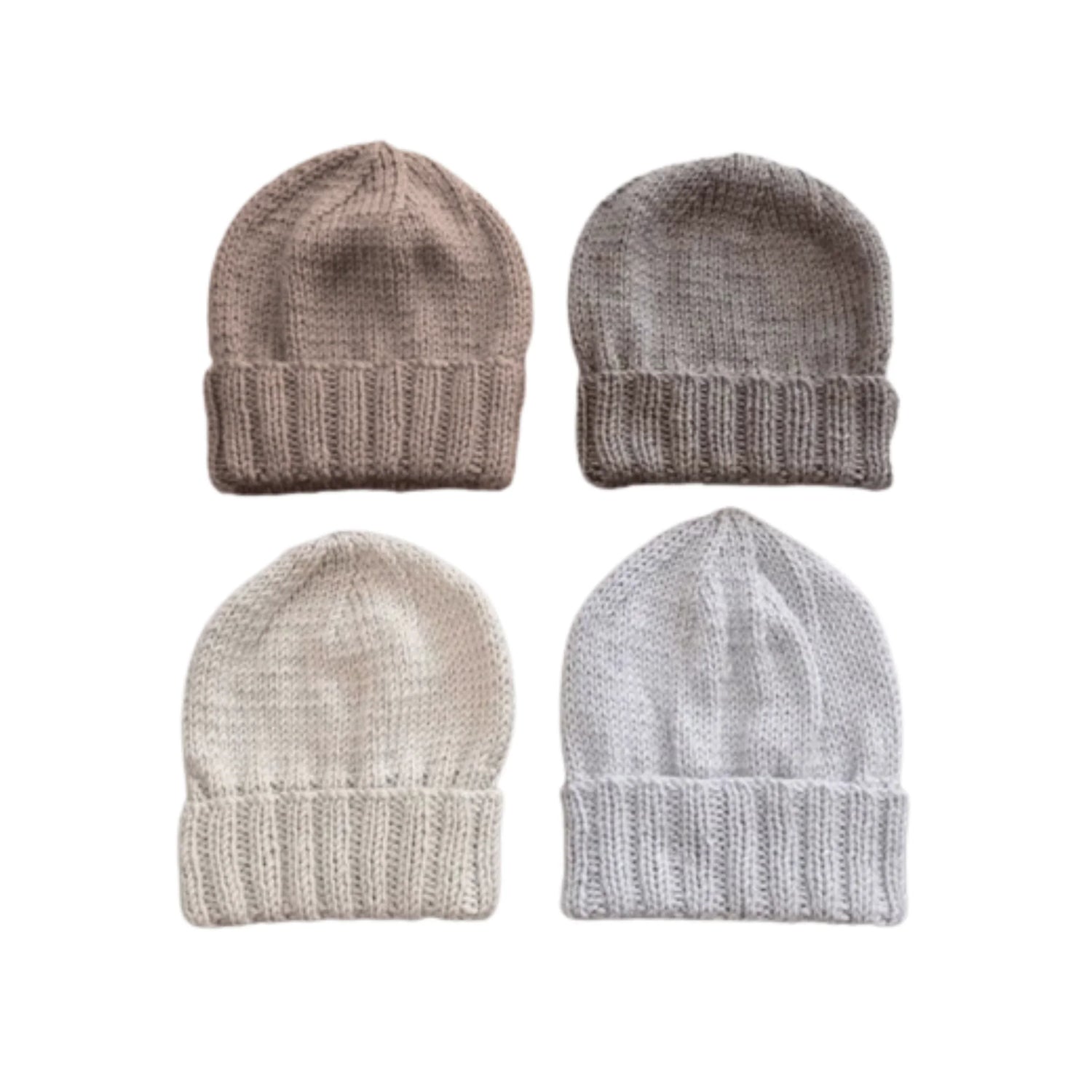 Four cozy knit beanies in neutral tones, perfect for baby, kids, and adults. Soft, ribbed, everyday essentials.
