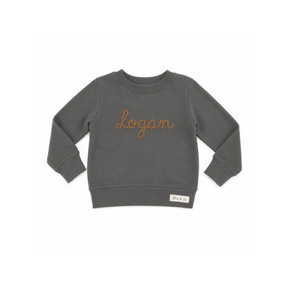 Grey kids sweatshirt with 'Logan' embroidered in brown, featuring Ella & Jo brand tag
