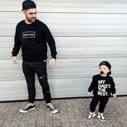 Matching black 'Best Dad' and 'My Dad's The Best' sweatshirts for dad and toddler, casual family outfits