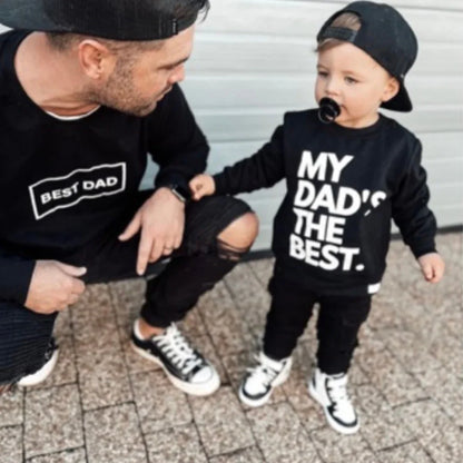 Matching black 'Best Dad' and 'My Dad's The Best' sweatshirts for dad and toddler, stylish family outfits