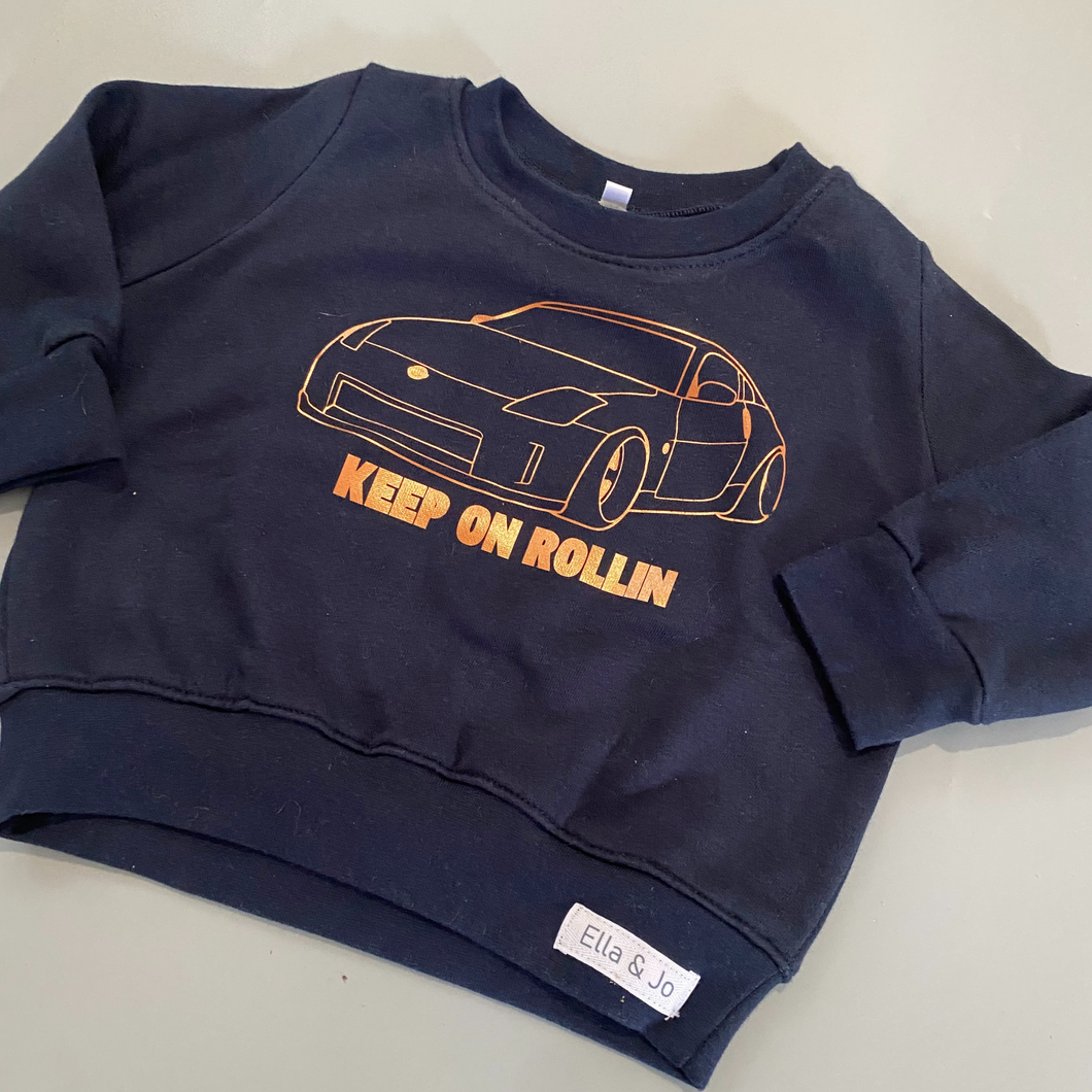 Keep on Rollin Sweater