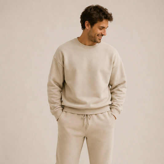 Man wearing beige sweatshirt and matching joggers, South African fashion