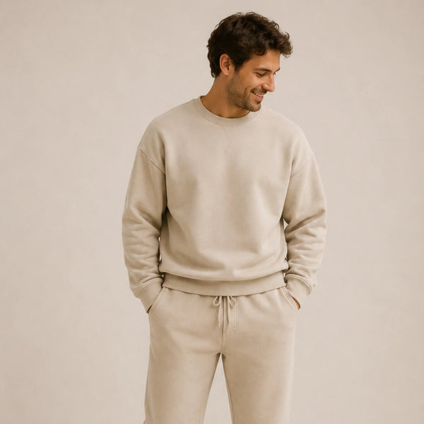 Man wearing beige sweatshirt and matching joggers, South African fashion