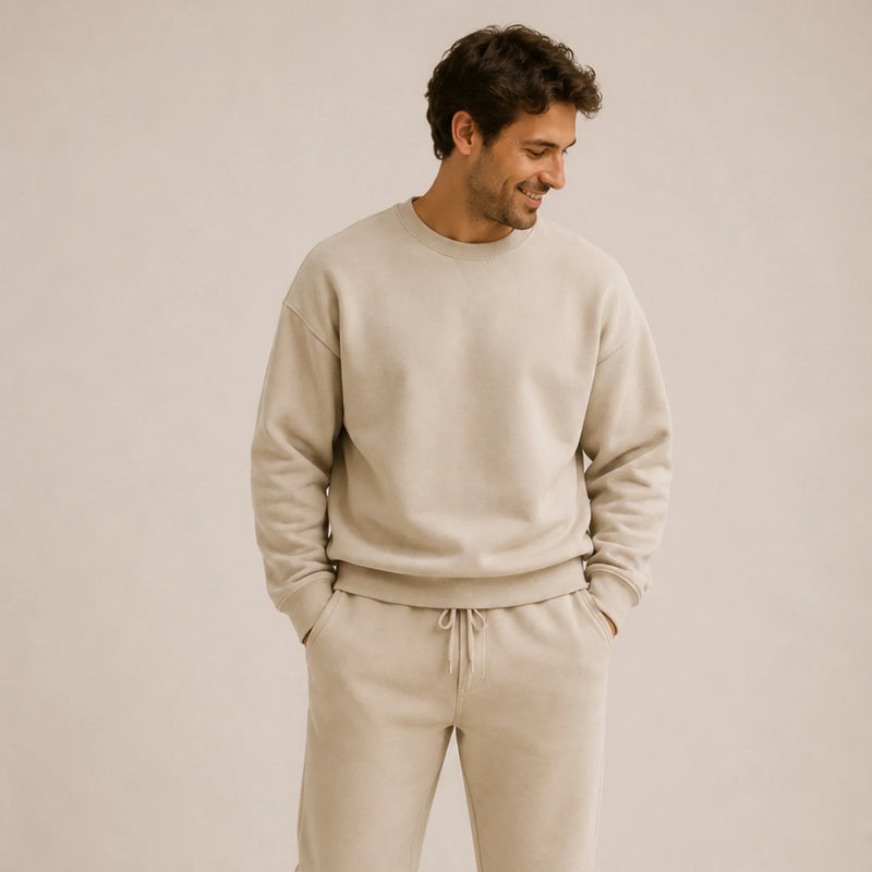 Man wearing beige sweatshirt and matching joggers, South African fashion